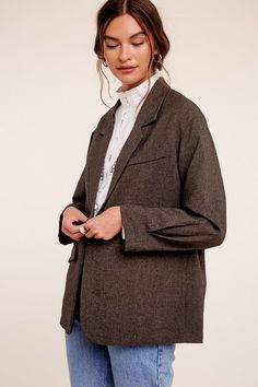 Oversized solid blazer Welt pocket on right front Long sleeves One button closure Model is 5' 9" 33 24 34 and wearing a size Small Sleek Solid Color Single-breasted Blazer, Sleek Solid Single-breasted Blazer, Gray Single-breasted Long Sleeve Blazer, Fitted Gray Single-breasted Blazer, Gray Double-breasted Blazer With Button Closure, Tie Waist Maxi Dress, Godet Skirt, Belted Shirt Dress, Long Sleeve Print Dress