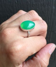 Lovely Elegant Oval Bright Green Chrysoprase Sterling Silver Ring by GildedBug on Etsy Handmade Green Oval Cabochon Ring, Handmade Green Emerald Oval Cabochon Ring, Handmade Green Rings For Everyday, Handmade Green Chrysoprase Ring, Handmade Green Rings For Everyday Wear, Chrysoprase Emerald Ring With Oval Cabochon For Gift, Handmade Green Chalcedony Rings, Green Chrysoprase Cabochon Rings, Green Oval Chalcedony Rings