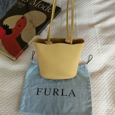 I Love This One. Great Vintage Condition! Pretty, Golden Yellow Color And The Cutest Flower Cut Outs On The Straps. Kept In Its Original Dust Bag As Pictured. Back Of Dust Bag Has A Couple Of Marks. Inside Of Bag Very Clean As Exterior Is Very Good Too. Furla Bag, Flower Cut Out, Furla Bags, Golden Yellow Color, Bags Vintage, Golden Yellow, Cut Outs, Yellow Color, The Cutest