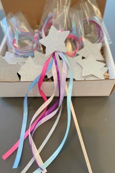 a box filled with lots of different colored streamers