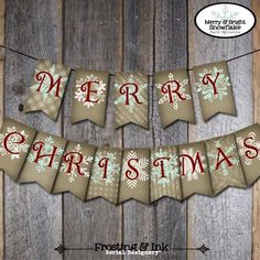 merry christmas banner with snowflakes hanging on a wooden wall next to an arrow