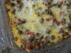 a casserole dish with meat and cheese on it