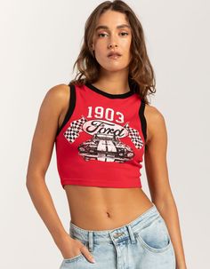 Ford 1903 Tank Top. Graphic Screened On Front. Crewneck. Sleeveless. Contrast Trim. Fitted And Cropped Silhouette. 58% Cotton, 37% Polyester, 5% Spandex. Machine Wash. Imported. Model Is Wearing A Size Small. Model Measurements:height: 5'8" Bust: 34"waist: 25"hips: 37.5" Graphic Print Stretch Tank Top, Summer Stretch Vest With Graphic Print, Fitted Graphic Print Crop Top With Racerback, Fitted Racerback Crop Top With Graphic Print, Fitted Sleeveless Tops With Graphic Print, Red Elastane Sleeveless Top, Red Sleeveless Elastane Top, Sporty Sleeveless Muscle Tee For Spring, Spring Sporty Sleeveless Muscle Tee