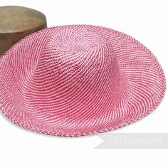 This pink candy twist capeline hat body is made from visca which is a Japanese wood pulp. From afar it has the appearance of parasisal straw, has a gorgeous shine and costs a fraction of the price!Floppy by nature, this checkerboard 1x1 weave visca can be blocked and stiffened just as you would with straw. For a more structured crown simply pop over buckram. If a romantic floppy brim is what you are after this is just superb!Capeline Measures:Flat measurement from crown tip to brim: 28cm (11 inc Pink Flat Brim Boater Hat For Beach, Pink Boater Hat With Curved Brim For The Beach, Pink Adjustable Hat With Curved Brim, Pink Brimmed Fedora For Beach, Flat Brim Pink Hat One Size, Adjustable Pink Bonnet Hat, Pink Straw Hat With Curved Brim, Adjustable Pink Bonnet, Pink Brimmed Hat One Size