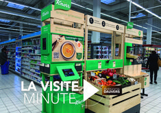 the produce section of a grocery store with people shopping in the background and an advertisement for la viette minute