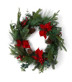 a christmas wreath with pine cones and poinsettis