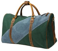 The FH Wadsworth Green Canvas & Blue Suede Duffel Bag is both stylish and functional. Made from a heavy duty green canvas and coupled with a diagonal light blue strip of suede. Brown full grain leather accents and side suede strips provide the perfect pop of color. This modern weekender bag brings luxury, durability, and timelessness to any destination. Conveniently meets all airline carry-on size requirements. Interior zipper pocket Detachable leather strap for shoulder or cross-body wear 2 Green Leather Duffle Bag With Luggage Sleeve, Green Leather Travel Bag With Luggage Sleeve, Green Rectangular Canvas Duffle Bag, Green Leather Travel Bag, Green Canvas Rectangular Weekender Bag, Green Canvas Weekender Bag With Large Capacity, Green Leather Bags With Leather Trim, Green Leather Bag With Leather Trim, Green Rectangular Canvas Weekender Bag