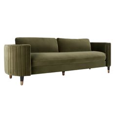 an olive green velvet sofa with wooden legs