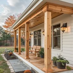 9+ Minimalist Front Porch Columns Ideas for a Clean Design • 333+ Inspiring Lifestyle Ideas White And Wood Front Porch, Home Side Entrance Ideas, White And Natural Wood Exterior, Wood Beams Front Porch Farmhouse, Front Porch Post Stain Colors, Wooden Beam Porch, Stained Posts On Front Porch, Cypress Posts Front Porch, Front Porch Post Ideas Columns