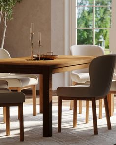 a wooden table with chairs around it