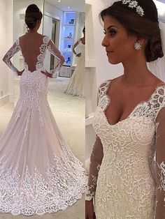 the back of a wedding dress with long sleeves