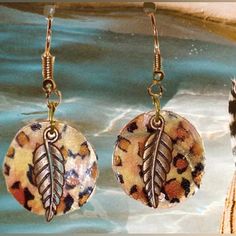 Reduced Lot Of 2: Cute Lightweight Round Leopard Print Discs Earrings I Made. Embellished With Bronze Colored Feathers Charms Attached. Fish Hook Drop Stylebearrings. I Have Paired This With A Coordinating Stretch Bracelet With Attractive Complementary Colors! Earrings Are New On Card From My Salon Boutique. Bracelet Is A Resale Item. Please Know That Poshmark Charges Me 20% Commission Fee. No Offers Accepted Unless You Bundle With Another Item Of Equal Or More Value. Discount Deal: Two Off 2 Bu Casual Brown Nickel-free Jewelry, Statement Earrings Wedding, Crystal Pearl Earrings, Skeleton Earrings, Winter Earrings, Ghost Earrings, Clover Earrings, Hippie Earrings, Crystal Dangle Earrings