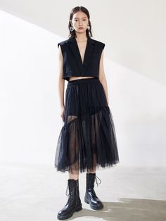 MO&Co. Ruffle Tulle Midi Skirt Mesh waist, irregular lace, slouchy, elongated proportions. Create a high-waisted mini skirt with a high-waisted design, which is just right for easy routing. Features : - Mesh design- Elastic waistCode : MBB2SKT025Back length of size M is 79.5cmModel is 178cm tall and wearing a size M MATERIALS & CARE : Material :100% PolyamideUse a washing machine at the mild process of 30℃Do not bleachDo not tumble dryIron at low temperature Wash with special detergents for silk Mesh Black Skirt Outfit, Tulle Skirt Outfits, Tulle Skirt Wedding Outfit, Black Mesh Skirt Outfit, Punk Tulle Skirt, Ruffle Mesh Skirt, Tulle Skirt Outfit, Black Ruffle Skirt Outfit, Lace Midi Skirt Outfit