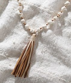 "Sterling & Stitch Tassel Beaded Necklace - Brown/Silver/Cream 26-31, Women's Silverhowlite Sterling silver plated necklace Length measures 27". Apparel & Accessories" Adjustable Cream Jewelry With Large Beads, Adjustable White Tassel Necklace, Adjustable White Necklaces With Dangling Beads, White Adjustable Necklace With Dangling Beads, Beige Large Beads Jewelry Gift, Cream Jewelry With Large Beads As A Gift, White Necklace With Dangling Beads, Cream Jewelry With Large Beads For Gift, Adjustable Long Beige Beaded Necklace