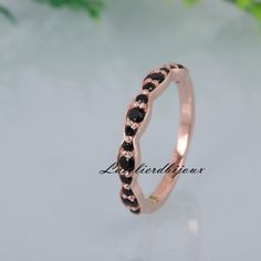 Natural Black Onyx Wedding Band, 14k Rose Gold Matching Bridal Jewelry, Half Eternity Jewelry Black Gemstone Ring, Promise Personalized Ring Brand - LATELIERDBIJOUX Type Of Stone - Natural Black Onyx Stone Color- Black Cut of Stones - Round Stone Size - 2mm Birthstone - December Check out my other items! PAYMENTS We accept PayPal, If we do not receive payments immediately we will hold the item only for one working day for your payments and we will be re-listing the item afterward. if there is di Black Round Eternity Band For Anniversary, Black Eternity Band For Anniversary, Elegant Black Eternity Band For Anniversary, Black Round Band Jewelry For Wedding, Elegant Rose Gold Rings With Black Diamonds, Elegant Rose Gold Ring With Black Diamonds, Black Stackable Wedding Jewelry, Black Stackable Jewelry For Wedding, Elegant Black Stackable Wedding Rings