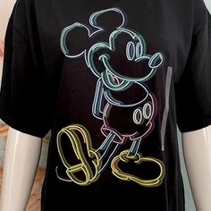 a black shirt with a mickey mouse design on it