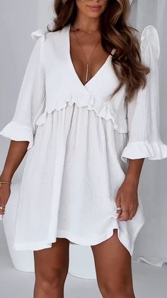 Style:casualColor:Rose red, white, apricotSeason:summerNeckline:V neckSleeve Length:mid sleeveMaterial:Cotton, BlendedSize:S/M/L/XL/2XL/3XL/4XL/5XLSize Chart：LengthBustSleeve LengthCMinchCMinchCMinchS9336.69838.64016.0M9437.010340.64116.4L9537.410842.54216.5XL9637.811344.54316.92XL9738.211846.54417.33XL9838.612348.44517.74XL9939.012850.44618.15XL10039.413352.44718.5This data was obtained from manually measuring the product, it may be off by 1-2 CM. White V-neck Mini Dress For Summer, Feminine V-neck Mini Dress For Vacation, Long Sleeve Solid Color Mini Dress For Beach, White Split Neck Mini Dress For Spring, White Mini Dress With Split Neck For Spring, V-neck Solid Color Beach Dress, White Mini Dress With Notched Neckline For Summer, White Beach Dress With Notched Neckline, Spring Beach Mini Dress With Notched Neckline