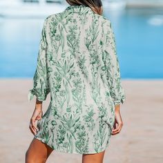 Introducing our Sage Floral Button-Up Cover-Up. The sage hue and delicate floral motifs create an effortlessly chic look, making it the perfect companion for beach days. Product code: CAA07A4A005GP Green Spring Cover-up For Beach Party, Green Long Sleeve Beachwear Swimwear, Green Long Sleeve Swimwear For Beach, Green Long Sleeve Swimwear For Poolside, Casual Long Sleeve Swimwear For Day Out, Green Long Sleeve Beach Dress As Cover-up, Green Long Sleeve Beach Dress For Cover-up, Spring Long Sleeve Swimwear For Beach, Long Sleeve Beach Dress For Spring Poolside