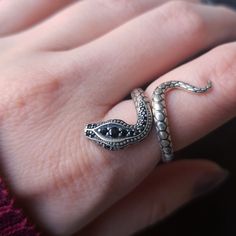 "Silver Snake Ring, Adjustable Snake Ring 925k Silver, Hecate's Snake Ring, Snake Goddess Ring, Serpent Ring, Women's Men's Gothic Ring Hecate's Sacred Animal, Snakes ◑ HECATE was the goddess of magic, witchcraft, the night, moon, ghosts and necromancy. She was the only child of the Titanes Perses and Asteria from whom she received her power over heaven, earth, and sea. \"Hecate's themes are the moon, beginnings and magic. Her symbols are serpents, horses or dogs ,which are her sacred animals, t Sterling Silver Snake Ring For Promise, Adjustable Sterling Silver Snake Ring For Promise, Sterling Silver Open Snake Ring In Fine Jewelry Style, Silver Snake Ring With Gemstone For Anniversary, Sterling Silver Open Snake Ring For Promise, Silver Snake Ring Fine Jewelry For Gift, Sterling Silver Snake Toe Ring As Gift, Adjustable Sterling Silver Snake Ring For Anniversary, Unique Snake Ring Stamped 925 As A Gift