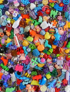 a pile of assorted buttons and charms