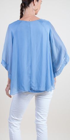 Round Neck Silk Top with 3/4 Length Bell Sleeves. Features a 100% Silk Exterior Layer and a Soft Viscose Inner Lining. Exterior: 100% Silk Interior: 95% Viscose, 5% Elastic Made in Italy One Size Model is 5'7 Scarf Sale, Blouse Pants, Knitted Coat, Linen Bag, Silk Top, Sweater Skirt, Handbags On Sale, Tunic Dress, Sales Gifts