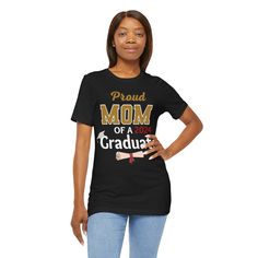 Proud Mom of 2024 Graduate Shirt - Graduation Shirt for Mom Proud mom of 2024 graduate shirt - graduation shirt for mom, graduation gift class of 2023 seniors shirt. This classic unisex jersey short sleeve tee fits like a well-loved favorite. Soft cotton and quality print make users fall in love with it over and over again. These t-shirts have-ribbed knit collars to bolster shaping. The shoulders have taping for better fit over time. Dual side seams hold the garment's shape for longer. .: 100% A My Mommy Did It Graduation Shirt, Graduate Mom Shirt, Proud Mom Of A 2023 Graduate Shirt, Senior Shirts, Graduation Shirts, Proud Mom, Cotton Fiber, Free Jewelry, Graduation Gifts