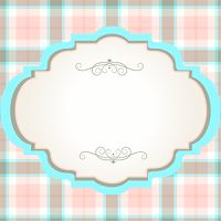 a blue and white frame on a plaid background