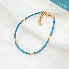 2022 Jewelry high-quality bohemian colorful adjustable handmade natural tiny stone Miyuki beaded bracelet. Stylish everyday tiny bead bracelet! A beautiful dainty bracelet with tiny glass beads in 18kt gold-filled beads. - Plating: 18K Brass gold - 6.75"+1.5" extension - Lobster Clasp - Material: 2mm MIYUKI beads, natural stone - Occasion: Anniversary, Engagement, Gift, Party, Wedding - Style: TRENDY Gold Heishi Beads Friendship Bracelet, Gold Bracelets With Tiny Beads For Festival, Gold Heishi Beads Bracelets For Festivals, Turquoise Beaded Bracelets With Gold Beads As Gift, Bohemian Gold Friendship Bracelets With Spacer Beads, Gold Bohemian Friendship Bracelets With Spacer Beads, Bohemian Gold Heishi Beads Bracelets, Bohemian Gold Friendship Bracelets With Tiny Beads, Gold Heishi Beads Beaded Bracelets Gift