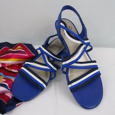 Stretch Elastic Sandal From Impo. A Playfully Interlaced Vamp Comprised Of Soft And Comfy Stretch Elastic Details Is Complemented By A Slip-On-And-Go Vegan Backstrap, Soft Cushioned Insole, And A Flexible Unit Bottom. In Brand New Never Worn Condition. Size 7.5m. Royal, White And Navy. Open To Reasonable Offers, Bundle With Other Items For Discount And Savings On Shipping. Blue Synthetic Wedge Sandals With Block Heel, Casual Blue Sandals With Low Heel, Casual Blue Low Heel Sandals, Blue Block Heel Wedge Sandals For Beach, Blue Block Heel Wedge Sandals For Summer, Blue Wedge Sandals, Blue Wedges, Wedge Flip Flops, Cork Wedges Sandals