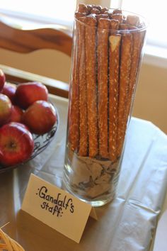 apples and cinnamon sticks are on the table