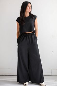 Seasonal Spirit Black Jumpsuit Wide Leg Jumpsuits, Jumpsuit Wide Leg, Casual Bodysuit, Rust Dress, Puff Sleeve Dresses, Crop Top Shirts, Casual Jumpsuit, Rounded Neckline, Leg Design