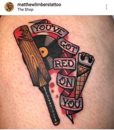 a tattoo on the back of a woman's thigh that reads you've got red on you