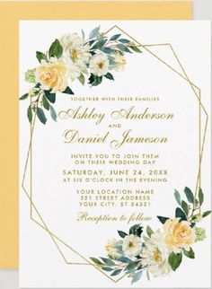 an elegant wedding card with flowers and greenery on the front, in gold foil