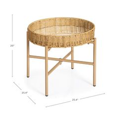 a wicker coffee table with measurements for the top