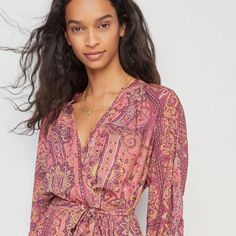 Knee Length Dress From Anthropologie Pink/Purple Paisley Pattern Pockets! Never Worn Tags On Flowy Design Mauve V-neck Midi Dress, Purple Paisley Print Spring Dress, Purple Paisley Print Dress For Spring, Feminine Purple Long Sleeve Maxi Dress, Purple Flowy Long Sleeve Midi Dress, Purple Long Sleeve Flowy Midi Dress, Bohemian Mauve V-neck Dress, Spring Pink Paisley Print Mini Dress, Spring Pink Paisley Mini Dress