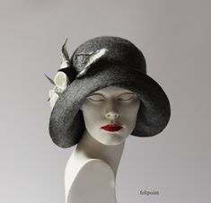 I made the Mrs Fisher style hat by hand, entirely from the highest quality merino wool. Beautiful shades of gray color of the hat.   The hat is soft, very pleasant to the touch, nicely placed on the head.  Special and unique ! Sophisticated and elegant ! I can make this hat in other colors and sizes. Made just for you  All my works are made by hand  in the process of long-term, hand felting My products are unique, designed by me, always made from the finest materials. I hope that they will give you a lot of joy.  Thank you for visiting my shop:-) My other hats you can find here: https://www.etsy.com/shop/Feltpoint?ref=hdr_shop_menu&section_id=17484098   Images and all content: FELTPOINT. I save my ideas and designs by copyright.  All Rights Reserved. Gray Fitted Felt Hat For Winter, Gray Felt Hat For Winter, Elegant Gray Hat With Short Brim, Elegant Gray Felt Hat With Short Brim, Elegant Gray Fedora For Winter, Elegant Gray Brimmed Felt Hat, Elegant Gray Wide Brim Felt Hat, Fitted Gray Wool Hat, Elegant Gray Felt Hat With Curved Brim