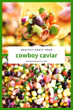 the healthy party food cowboy caviar is being held up by a hand with corn, beans and avocado