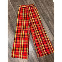 Vintage 1970s Red Orange Green & Yellow Plaid Tartan High Waisted Wide Leg Flare Pants Trousers No Material Tag Or Size But It Has A Cross Between Acrylic Cheesecloth/Hopsack/Linen Feel Size Xs ( I Believe If You Get The Sewing Undone Shown In Photo It Can Be Added An Extra Inch In The Waist) Measurements Laying Flat L-41.5 Waist-12 Hips-15.5 Inseam-29 Rise-14 Leg Hole-12 Wide Leg Flare Pants, Yellow Pants, Yellow Plaid, Vintage Pants, Pants Trousers, Vintage 1970s, Flare Pants, Green Yellow, Red Yellow