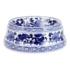 a blue and white bowl sitting on top of a table