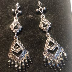 Nwot Metal Earrings That Won’t Weigh Down Your Lobes. Lightweight But Look Like Heavy Metal Or Silver. Small Black Stones On Several Parts Of The Earring. Measures About 2” In Length. Great Earrings For You Or As A Gift. Comes With Box. Silver Metal Beaded Earrings, Silver Beaded Pierced Earrings, Silver Nickel-free Chandelier Earrings For Evening, Black Stones, Metal Earrings, Earrings Color, Black Stone, Long Earrings, Heavy Metal