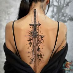 A beautiful sword tattoo featuring a detailed and delicate design, accented with floral and decorative elements. Ideal for women seeking an elegant and feminine tattoo on the back. Check out inktat2.com for more inspiring designs. Save this pin for future reference! Female Spine Tattoos, Tattoo Female, Muster Tattoos, Back Tattoo Women, Spine Tattoos