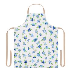 an apron with blue flowers and green leaves on the front, is shown in white