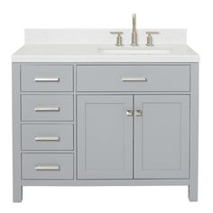 a bathroom vanity with two sinks and drawers