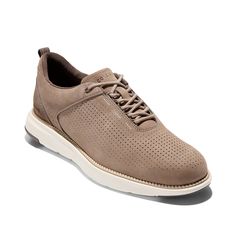 Cole Haan-Grand Atlas Text Oxford Easily switch from work to weekend mode with sleek style of the Grand Atlas Text oxford from Cole Haan. The lace-up sneaker displays perforation details that elevate its style quo. A Grandfoam cushioned footbed keeps you comfortable all day. Lace-up Oxfords With Perforated Toe Box For Business Casual, Business Casual Sneakers With Textured Sole, Business Casual Lace-up Oxfords, Business Casual Lace-up Sneakers With Textured Sole, Casual Lace-up Oxfords For Business Casual, Casual Oxfords With Perforated Toe Box For Work, Casual Workwear Oxfords With Perforated Toe Box, Casual Sneakers With Brogue Detailing For Business Casual, Modern Lace-up Business Casual Sneakers