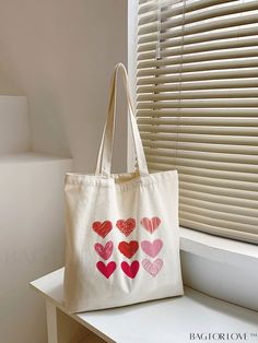 BagForLove - Canvas Shopper Bag with Heart Graphic for Students in College, University, and High School Product Description Color Beige Strap Type Double Handle Pattern Type Heart Bag Size Large Style Preppy Type Shopper Bag Magnetic No Material Fabric Composition 100% Polyester Size Chart INCH CM Bag Length Bag Width Bag Height Handle Height 13.4 inch 0.4 inch 15.4 inch 9.4 inch Bag Length Bag Width Bag Height Handle Height 34 cm 1 cm 39 cm 24 cm Details Pictures Similar Products h2 { text-alig Tod Bag, Creative Tote Bag, Diy Tote Bag Design, Painted Canvas Bags, Handpainted Tote Bags, Canvas Shopper Bag, Canvas Bag Design, Printed Canvas Bag, Best Tote Bags