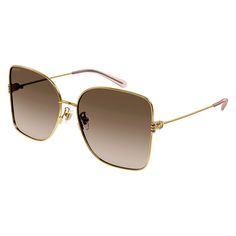 Elevate your style with the timeless elegance of the Gucci GG1282SA 003 Gold/Brown Gradient sunglasses, exclusively from OSSA FRAMES. Crafted with precision and artistry, these designer frames are the perfect accessory for the modern woman who appreciates luxury and sophistication. The striking gold metal frame is a standout feature of these Gucci sunglasses, exuding a sense of glamour and opulence. The brown gradient lenses add a touch of warmth and depth to the overall look, while providing excellent protection from the sun's harmful rays. With a lens socket width of 62 and a temple length of 140, these square-shaped sunglasses are designed to flatter a woman's face with effortless grace. The bridge size of 16 ensures a comfortable fit, while the RX-able feature allows for prescription l Luxury Gucci Sunglasses With Metal Frame, Gucci Gradient Sunglasses For Formal Occasions, Designer Brown Gucci Sunglasses, Gucci Tinted Sunglasses For Formal Occasions, Gucci Luxury Sunglasses For Formal Occasions, Brown Square Frame Sunglasses For Evening, Brown Mirrored Sunglasses For Evening, Classic Brown Sunglasses For Evening, Gucci Square Frame Metal Sunglasses