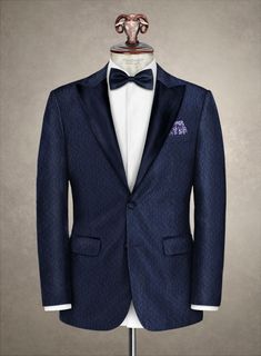 Grasp a glamorous opportunity to flaunt innate elegance by donning our Italian Rayman Tuxedo Jacket. Plus, our jacket is crafted from an exquisite blend of polyester and acrylic materials that showcases a dense, plush and gorgeous depth with an engraved detached wavy pattern over blue hues. Afterward, highlight the contour with flawless tailoring, which carries sartorial glory with a rounded fit and cozy yet elegant stance, an ideal match of elegance and class. Therefore, show your style with a Elegant Outerwear With Suit Collar And Custom Fit, Elegant Custom-fit Outerwear With Suit Collar, Elegant Custom Fit Outerwear With Suit Collar, Elegant Outerwear With Custom Fit And Suit Collar, Elegant Fitted Tuxedo For Winter, Elegant Custom Fit Long Sleeve Tuxedo, Elegant Blue Tuxedo For Winter, Elegant Winter Suit With Shawl Collar, Elegant Shawl Collar Winter Suits