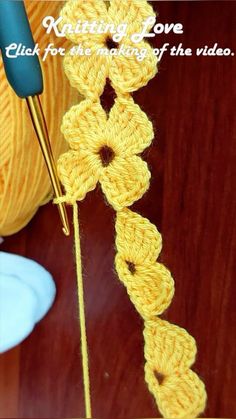 the crochet flower is being worked on