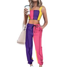 Purple Colorblock Crop Tank with Pant Set Fitted Color Block Pants For Summer, Fitted Summer Color Block Pants, Fitted Casual Color Block Pants, Trendy Multicolor Color Block Pants, Multicolor Color Block Sets For Summer, Summer Color Block Fitted Pants, Multicolor Cotton Sets With Color Block, Cheap Purple Color Block Top, Casual Pink Color Block Sets