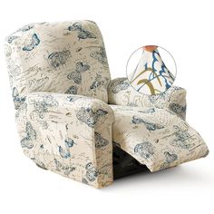 an upholstered recliner chair with a blue and white floral print on it